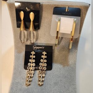 3 Pairs Of  Gold Tone and Clear Earrings. New.